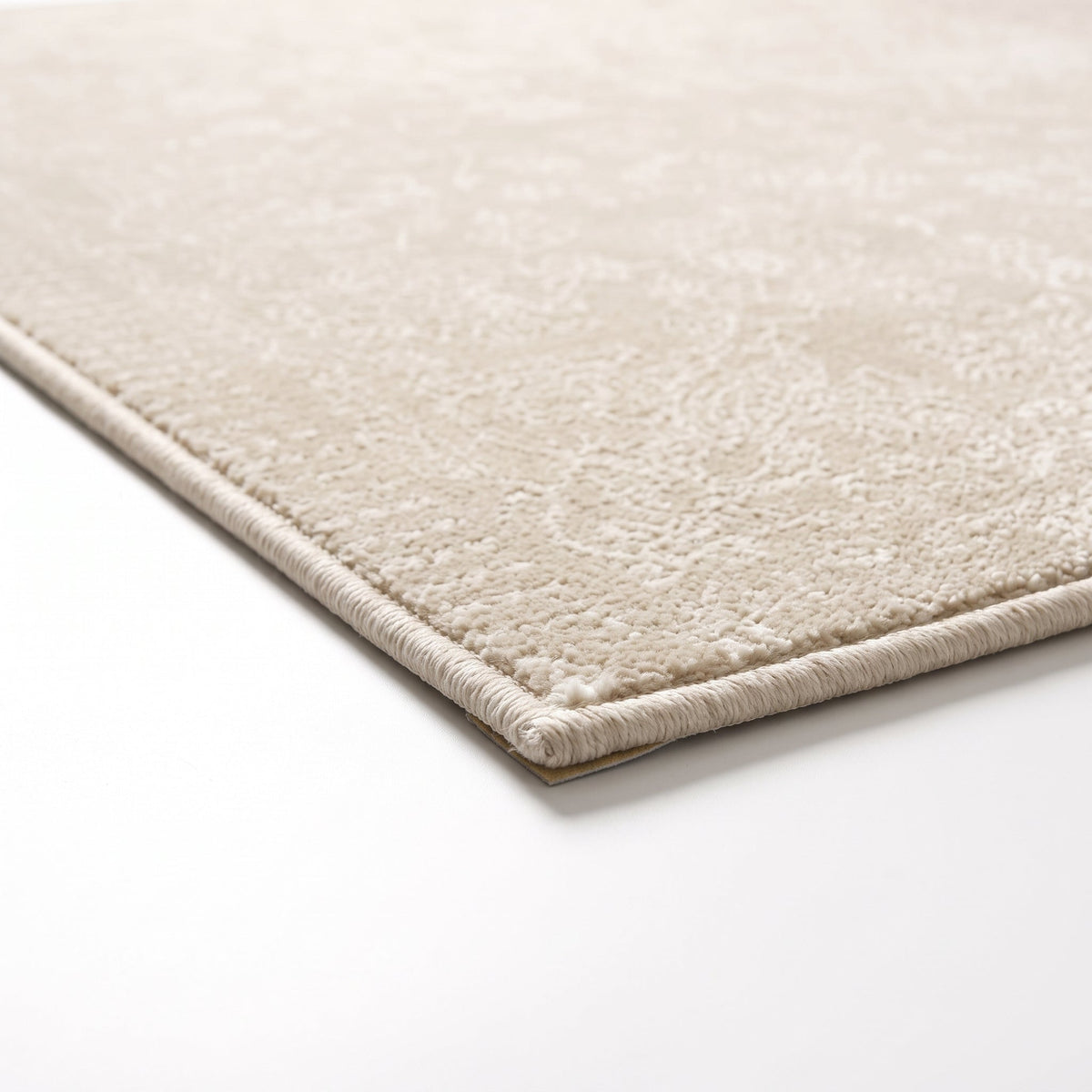 Détail du bord et de l'envers antidérapant, coloris crème beige