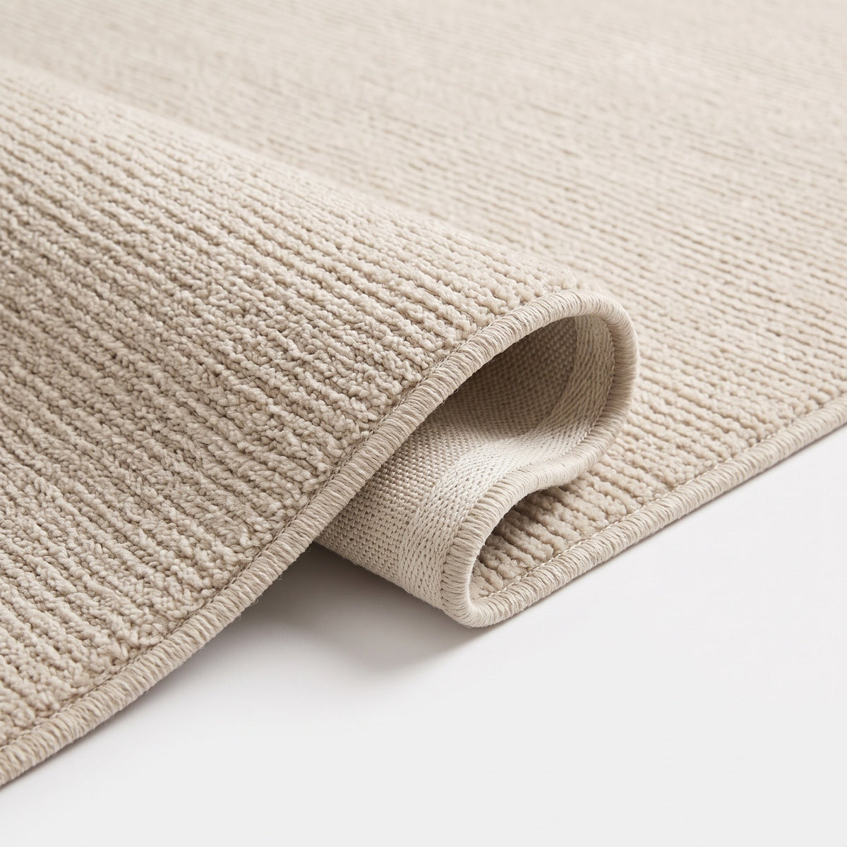 Détail du bord et de l'envers antidérapant, coloris blanc