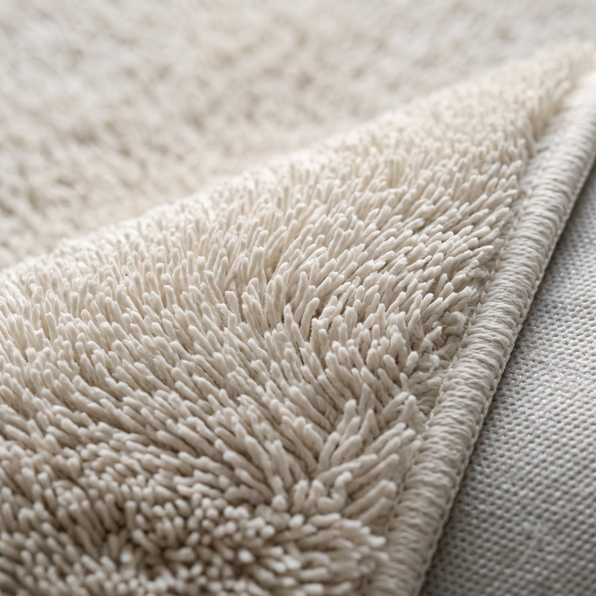 Gros plan sur la matière du Tapis de Bain Antidérapant Absorbant Blanc