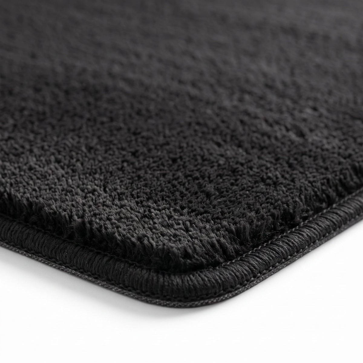 Gros plan sur la matière du Tapis de Bain Simple Antidérapant Noir